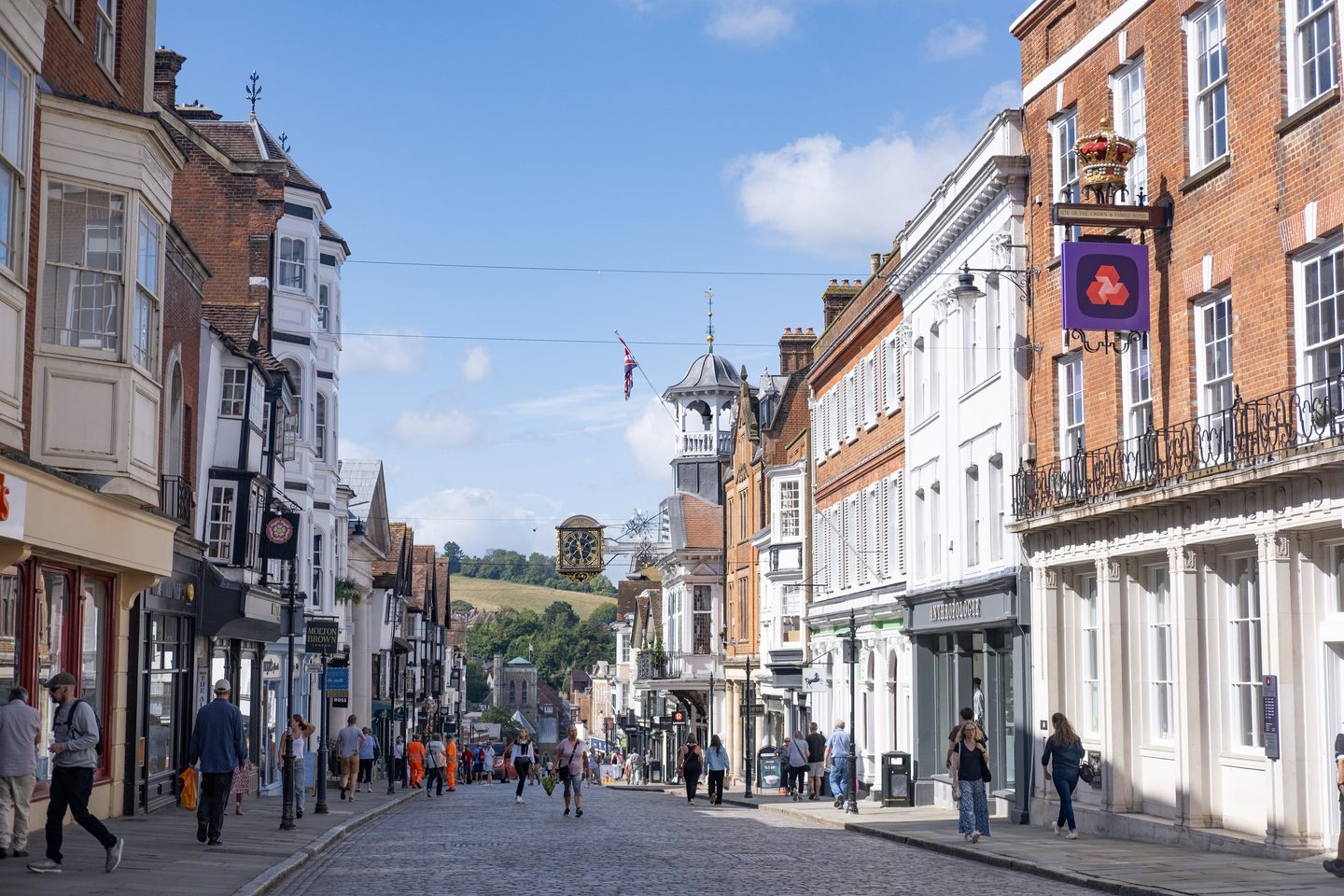 Period shopfronts along a traditional town centre high street